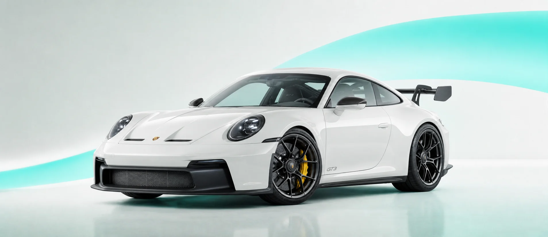 Pearl-white Porsche 911 GT3 in a BaseRate studio setting